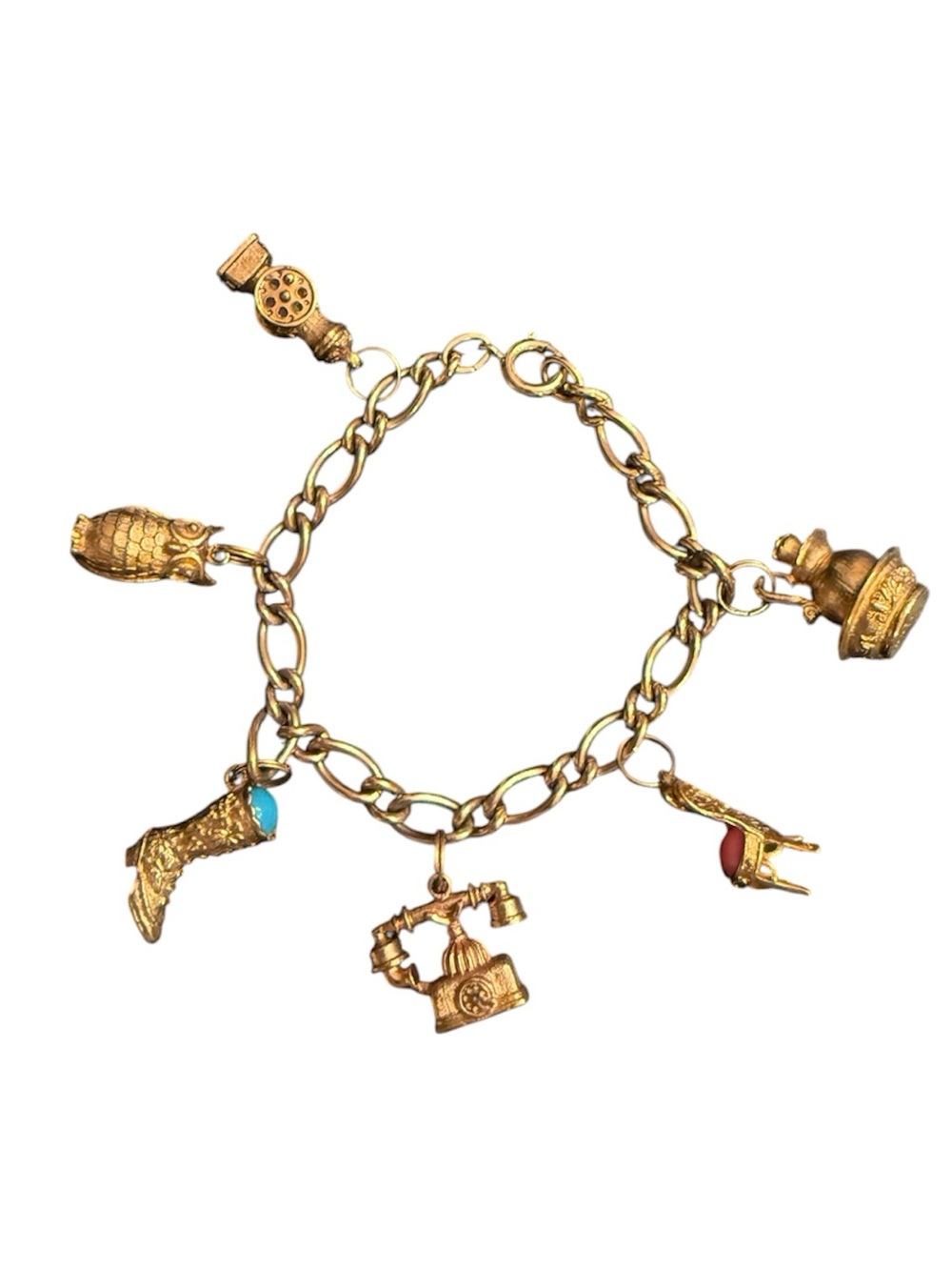 Avon Gold Tone Boot, Chair, Owl Phone Six Charm Bracelet Signed 7.5 inches